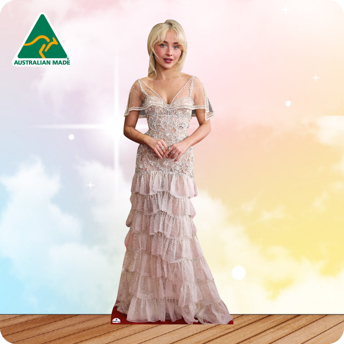 Sabrina carpenter in a beaded white long gown