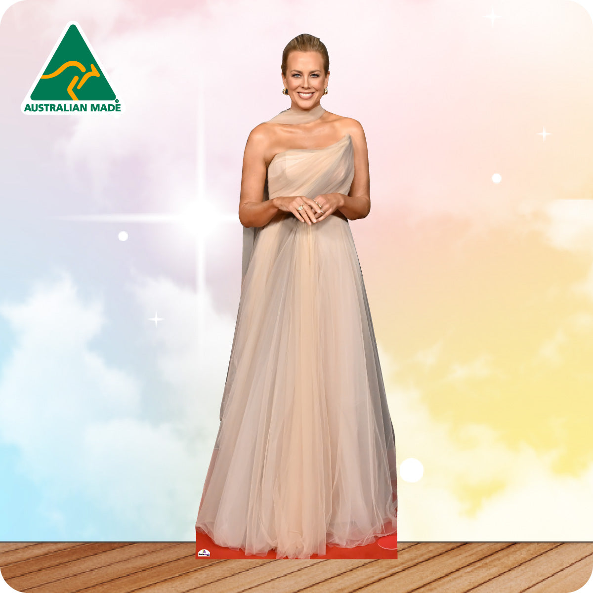 Cardboard cutout of a woman in a beige dress with 'Australian Made' logo in the corner.