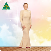 Woman in a beige dress standing on a wooden floor with a colorful background and 'Australian Made' logo.