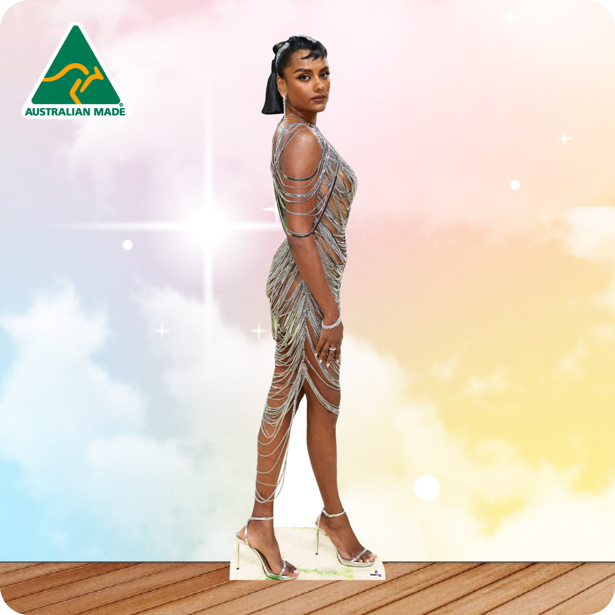 Woman in a evening gown on a colorful background with 'Australian Made' logo.