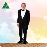 Cardboard cutout of a man in a tuxedo with an Australian Made logo on a colorful background.