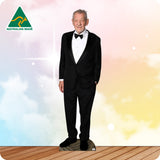 Cardboard cutout of a man in a tuxedo with an Australian Made logo on a colorful background.