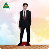 Cardboard standee of a person in a suit with 'Australian Made' logo on a colorful background