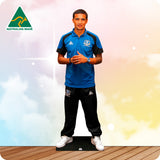 Cardboard cutout of a person wearing a blue and black sports outfit with 'Australian Made' logo in the corner.