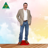 Cardboard standee of a man in a suit and jeans with 'Australian Made' logo on a colorful background.