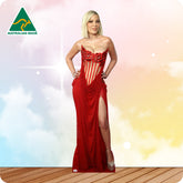 Life-size cardboard cutout of a woman in a red dress with 'Australian Made' logo in the corner.