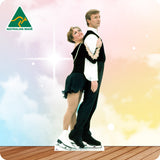 Cardboard cutout of a couple in formal attire with 'Australian Made' logo on a gradient background.