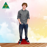 Cardboard cutout of a person wearing a gray shirt and jeans on a colorful background with 'Australian Made' logo.
