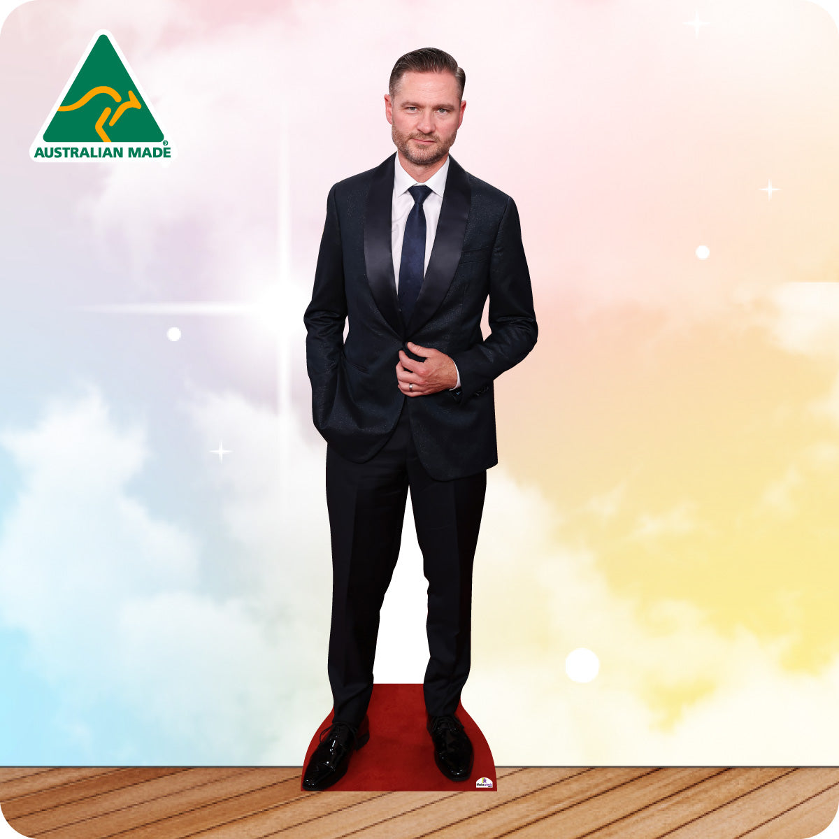 Cardboard standee of a man in a suit with 'Australian Made' logo on a colorful background