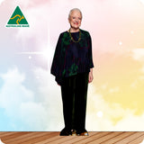 Woman in a dark outfit standing on a wooden floor with a colorful background and 'Australian Made' logo.