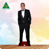 Cardboard cutout of a man wearing a suit standing in front of a colourful background with the Australian Made logo