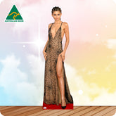 Cardboard cutout of a woman in a black dress with a spider web pattern on a colorful background, featuring 'Australian Made' branding.