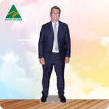 Cardboard cutout of a man in a suit with 'Australian Made' logo on a colorful background
