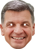 Cardboard cutout of a smiling man's face with cut-out eyes on a white background