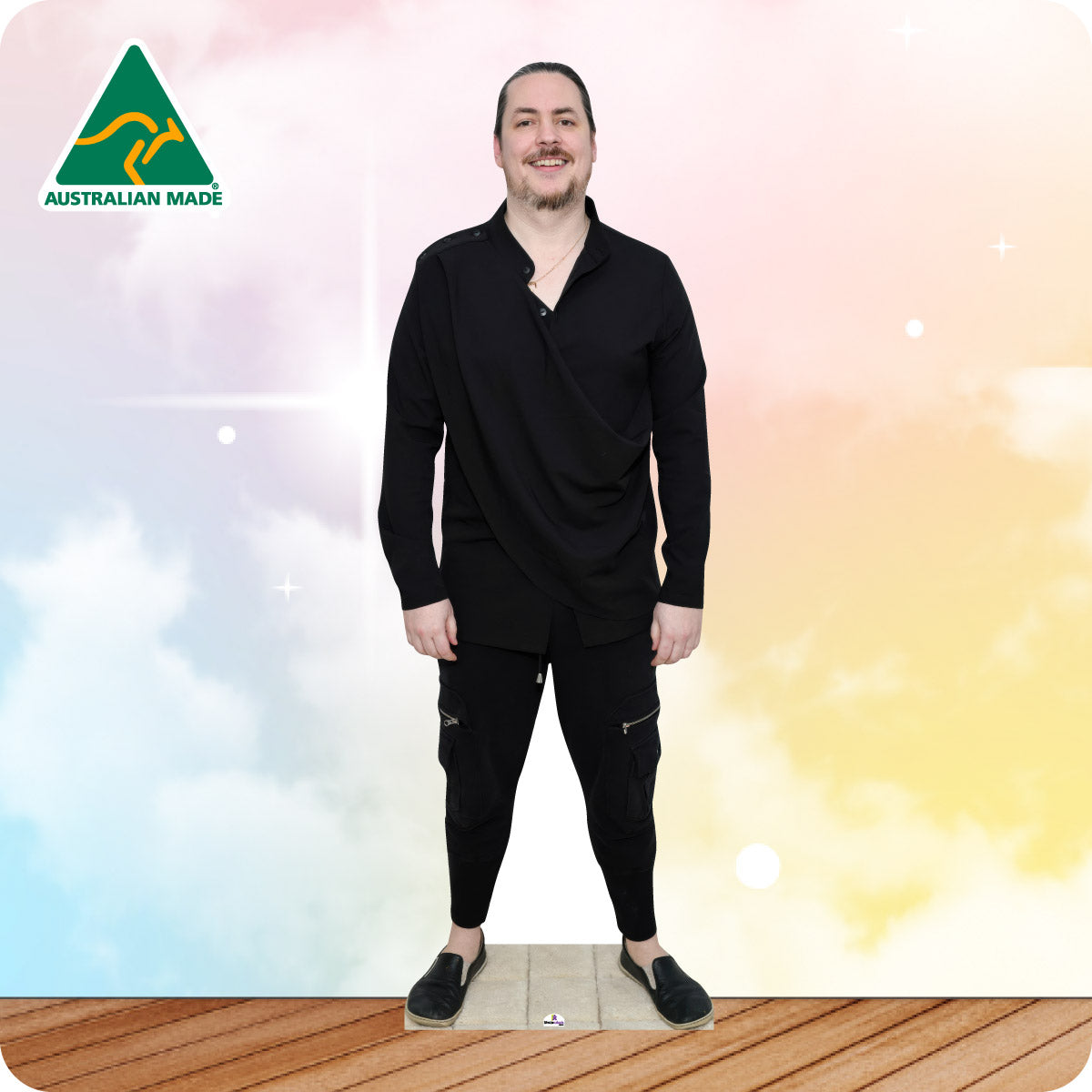 Cardboard cutout of a man wearing black with 'Australian Made' logo in the corner.
