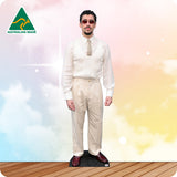 Benito Antonio Martínez Ocasio, known professionally as Bad Bunny in a white outfit
