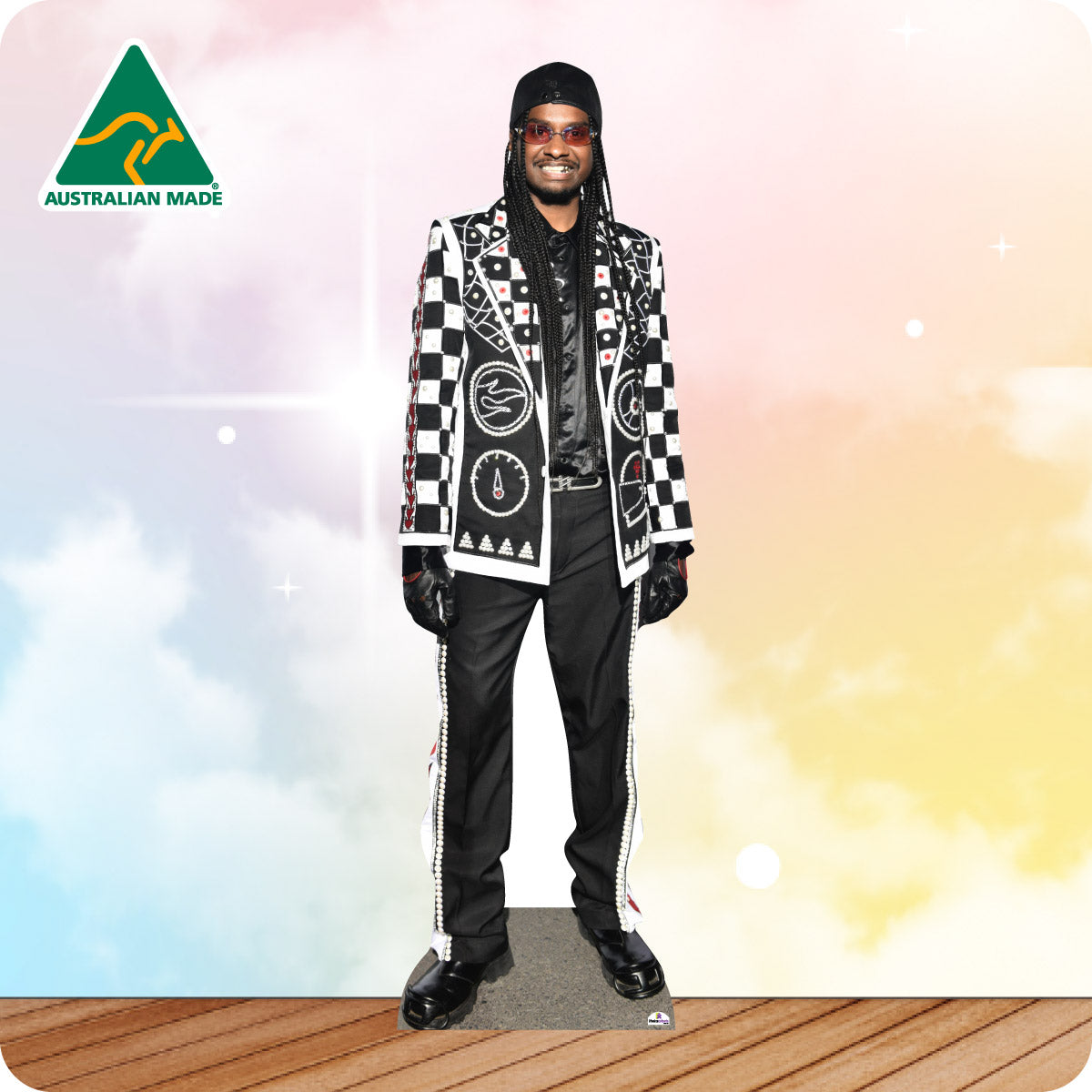 Cardboard cutout of a person wearing a checkered jacket with 'Australian Made' logo in the corner.