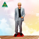 Cardboard cutout of a man in a suit with 'Australian Made' logo on a gradient background