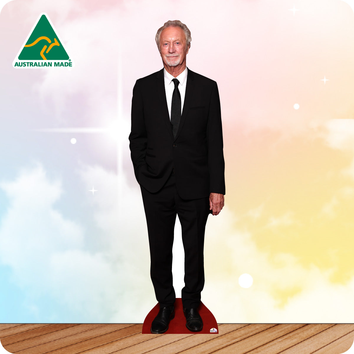 Cardboard cutout of a man in a suit with 'Australian Made' logo on a colorful background