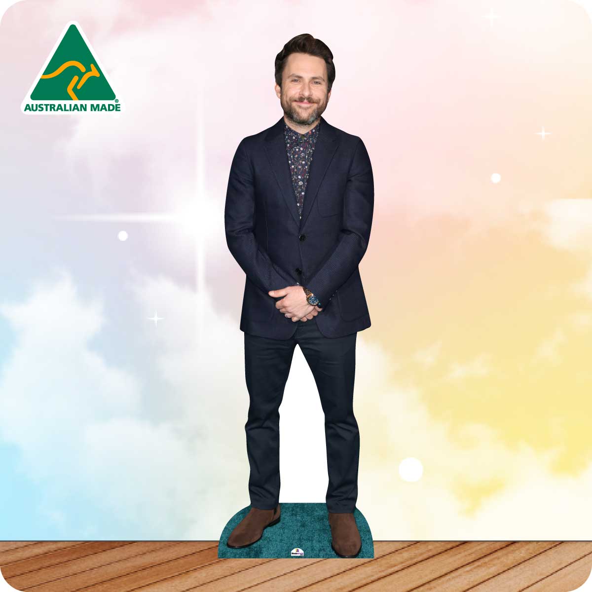 Cardboard cutout of a man in a suit with 'Australian Made' logo on a gradient background