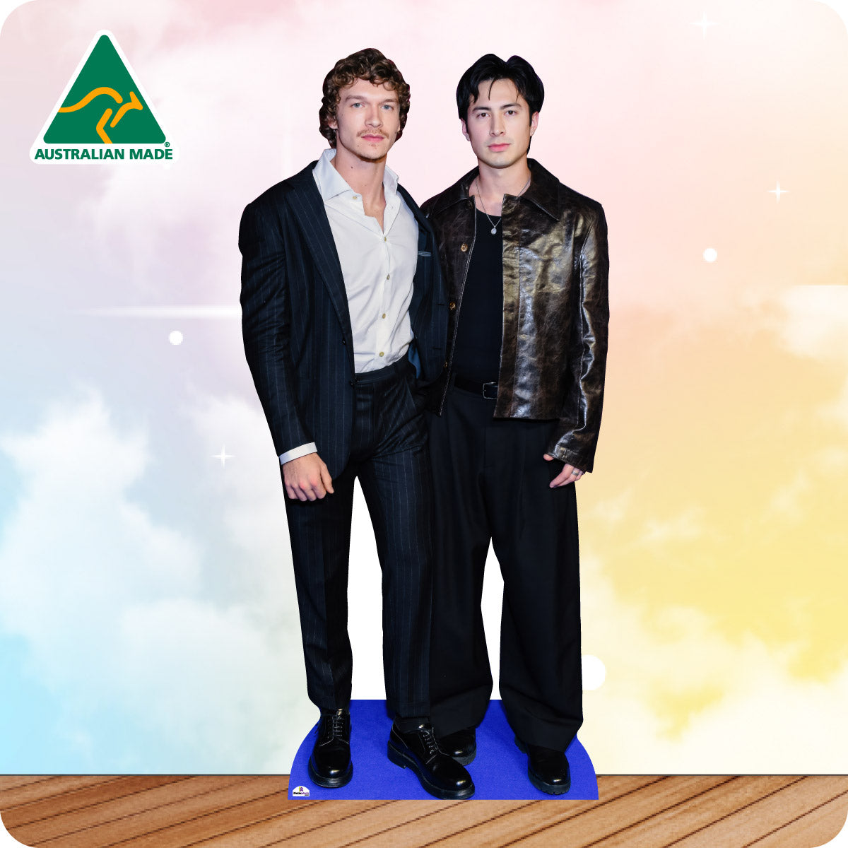 Cardboard cutout of two people in formal attire with 'Australian Made' logo in the corner.