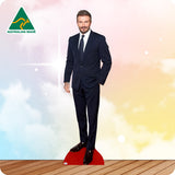Cardboard cutout of a man in a suit with 'Australian Made' logo on a colorful background