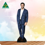 Cardboard cutout of a man in a blue suit with 'Australian Made' logo on a gradient background