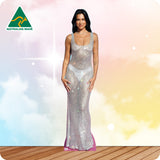 Woman in a sparkling silver dress on a colorful background with 'Australian Made' logo.
