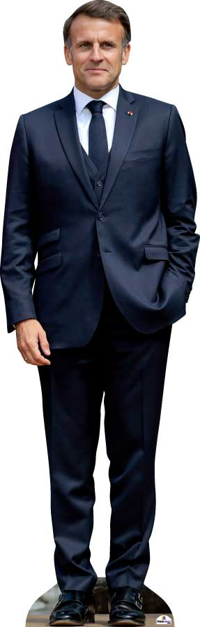 Cardboard cutout of a person wearing a navy suit with a white shirt and black shoes on a white background.
