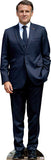 Cardboard cutout of a person wearing a navy suit with a white shirt and black shoes on a white background.
