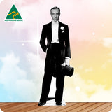Man in a formal suit with a hat on a gradient background, Australian Made logo visible.