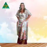 Woman wearing a floral dress with an 'Australian Made' logo in the corner.