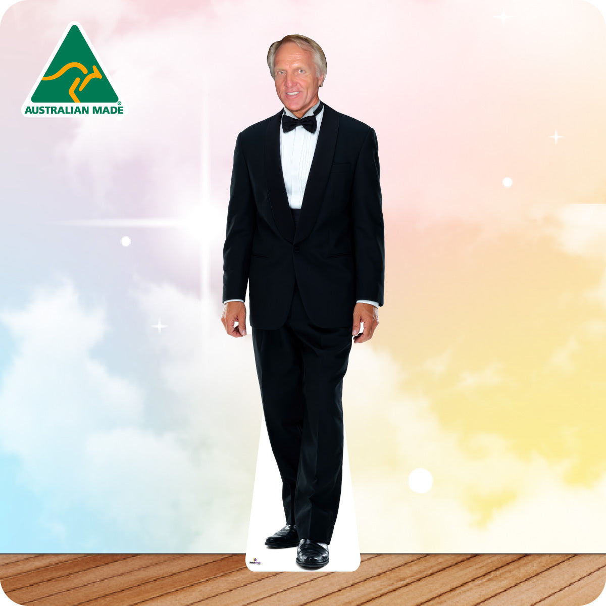 Cardboard cutout of a man in a black tuxedo with 'Australian Made' logo on a gradient background.