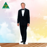 Cardboard cutout of a man in a black tuxedo with 'Australian Made' logo on a gradient background.