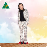 Person wearing a floral suit with a colorful background and 'Australian Made' logo.