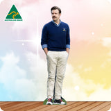 Man wearing a navy sweater and beige pants with a colorful background and 'Australian Made' logo.