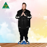 Person wearing a black jacket with white stripes on a colorful background with 'Australian Made' logo.