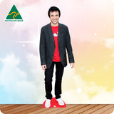 Cardboard cutout of a person wearing a suit and red shirt with 'Australian Made' logo in the corner.