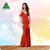 Woman wearing a red evening gown on a colorful background with 'Australian Made' logo.