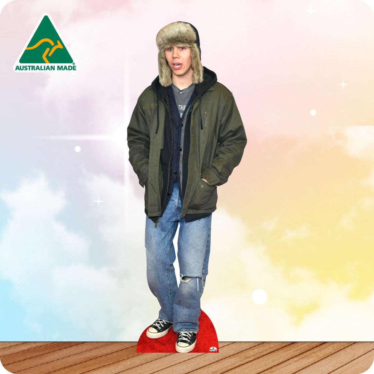 Cardboard cutout of a person wearing a green jacket and hat with 'Australian Made' logo.
