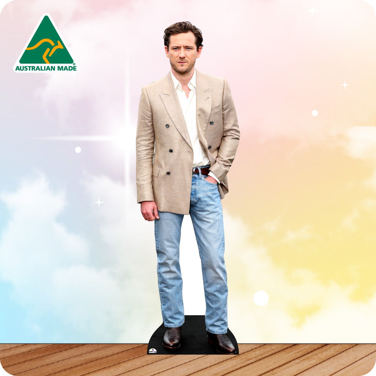 Cardboard cutout of a man wearing a beige blazer and blue jeans with 'Australian Made' logo in the corner.