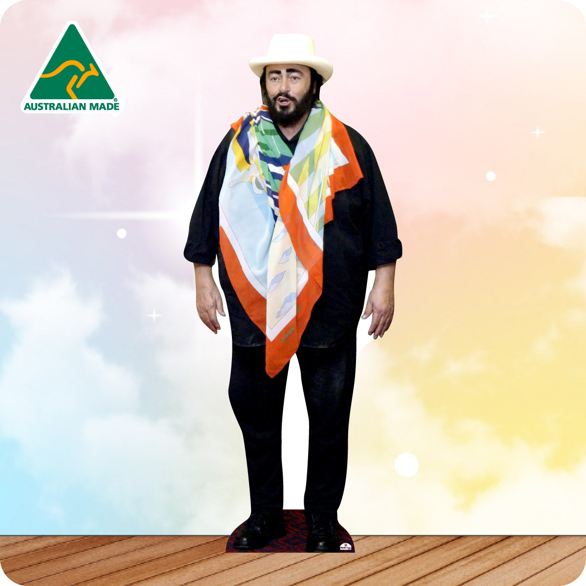 Cardboard standee of a man in a black outfit and a multi-coloured scarf with 'Australian Made' logo on a colorful background.