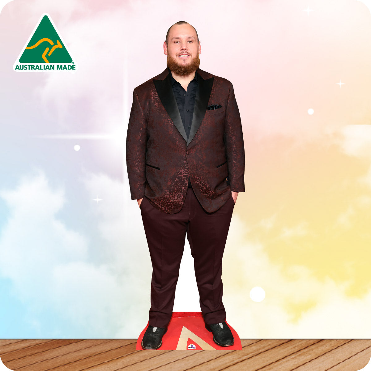 Cardboard standee of a man in a suit with 'Australian Made' logo on a colorful background