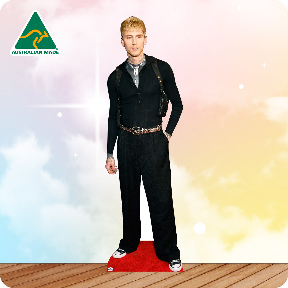 Cardboard cutout of a person in formal attire with 'Australian Made' logo on a colorful background