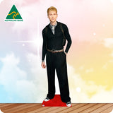 Cardboard cutout of a person in formal attire with 'Australian Made' logo on a colorful background