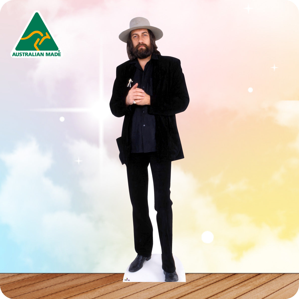 Cardboard cutout of a person in formal attire with 'Australian Made' logo on a gradient background