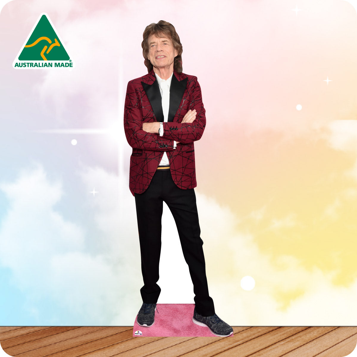 Cardboard cutout of a person in a red jacket with 'Australian Made' logo on a colorful background