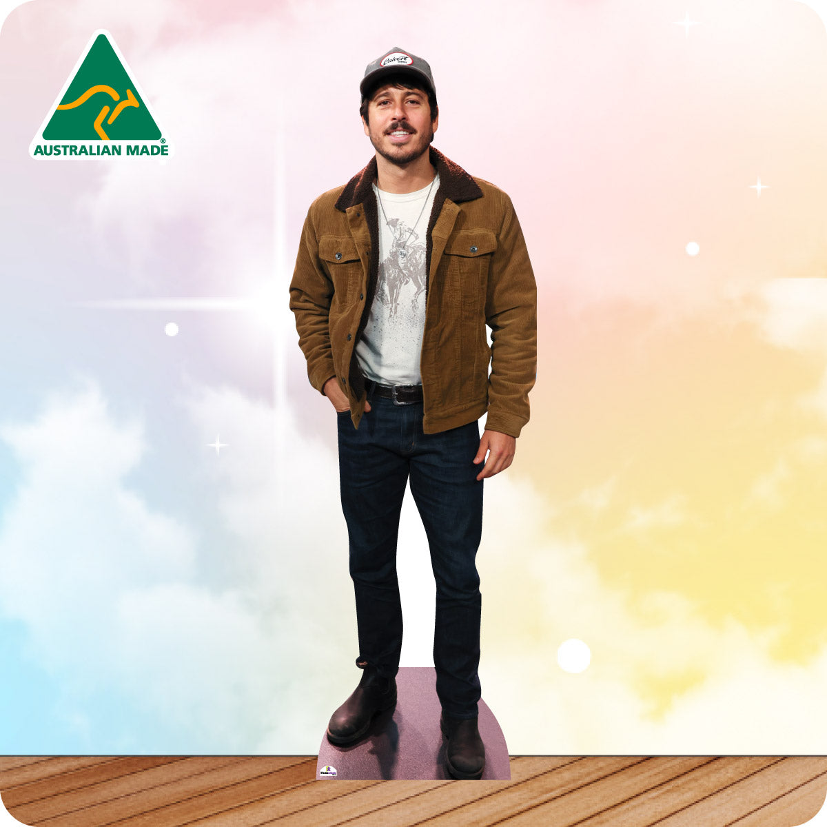 Cardboard standee of a man wearing a brown jacket and cap with 'Australian Made' logo in the corner.