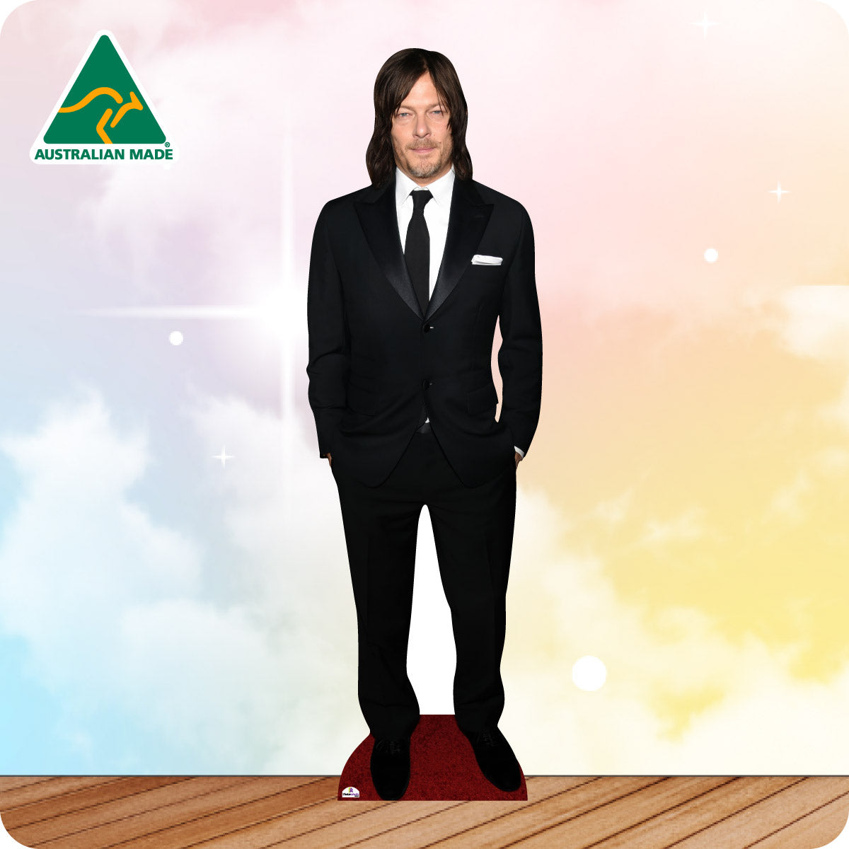 Cardboard cutout of a man in a suit with 'Australian Made' logo on a colorful background