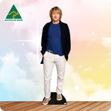Cardboard cutout of a person wearing a blue shirt and white pants with an Australian Made logo on a colorful background.